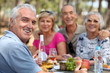 Older couples enjoying an alfresco lunch