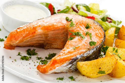 Photo: Grilled salmon, baked potatoes and vegetables Grilled salmon, baked potatoes and vegetables