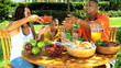 African American Family Healthy Eating in Garden