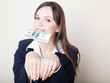 Young woman with 100 dollars in her mouth Young woman with 100 dollars in her mouth