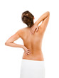 Woman massaging pain back isolated on white