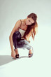 Beautiful young woman with a long braun hair posing Beautiful young woman with a long braun hair posing