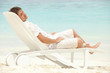 Happy man rest on the beach