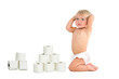Baby girl with bathroom tissue