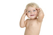Photo: Infant with hands on head Infant with hands on head