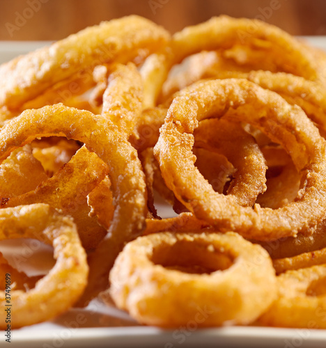 Photo: closeup photo of a pile of onion rings closeup photo of a pile of onion rings
