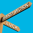 Hard Work Or Luck Directions On A Signpost