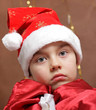 Portrait of a boy in a New Year's cap