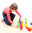 girl playing with skittles