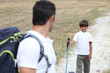 Man and little boy hiking