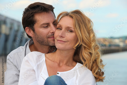 Photo: Portrait of a couple by the sea Portrait of a couple by the sea