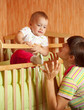 mother plays with baby mother plays with baby