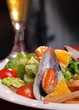 Warm salad from seafood