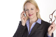 Portrait of an adult beautiful business woman speaking on a phon
