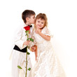 Little boy and girl wearing bride and groom fancy dresses Little boy and girl wearing bride and groom fancy dresses