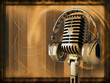 Microphone with headphones on background