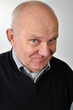senior man with ironic face expression