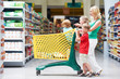 woman and children making shopping