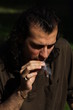 Person Smoking a Cigar