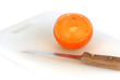 transparent orange on cutting board