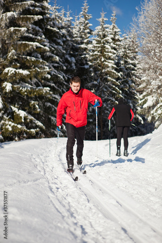 Photo: Cross-country skiing: young man cross-country skiing Cross-country skiing: young man cross-country skiing