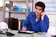 factory worker talking on the phone