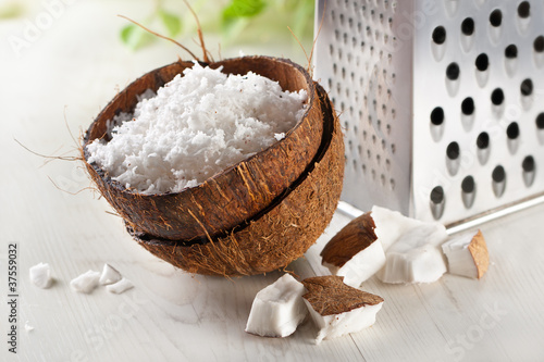 Photo: grated coconut with grater grated coconut with grater