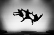 silhouette of friends jumping on trampoline silhouette of friends jumping on trampoline