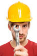 Construction worker holding wrench