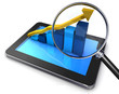 tablet business mit Lupe