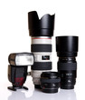 camera lenses with flash gun on white background