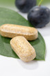 Photo: Bilberry pills and berries Bilberry pills and berries