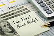 Photo: Tax forms with pen, calculator and money. Tax forms with pen, calculator and money.