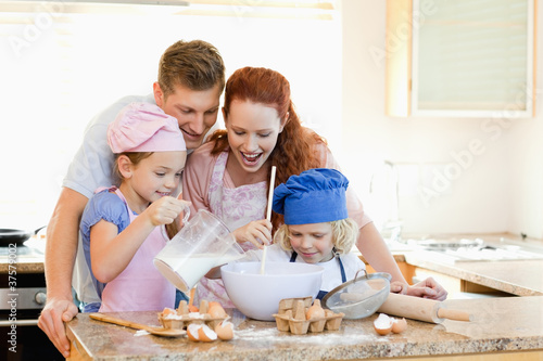 Photo: Family having a great time baking together Family having a great time baking together