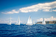 Sailing ship yachts with white sails