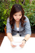 woman carry note paper.