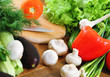 Fresh vegetables on the wooden background