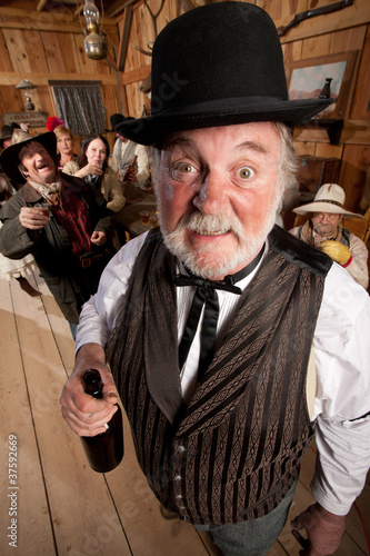 Photo: Drunk Man in an Old West Saloon Drunk Man in an Old West Saloon