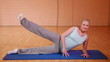 Woman in gym warming up