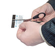 Photo: hands scissor a bank map hands scissor a bank map