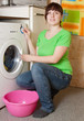 women loading the washing machine