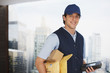 Deliveryman carrying packages and electronic device