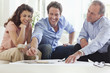 Couple talking with their financial advisor