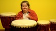down syndrome woman with djembe down syndrome woman with djembe