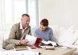 Interior designer showing samples to customer
