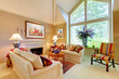 Photo: Elegant luxury living room with fireplace and large window. Elegant luxury living room with fireplace and large window.