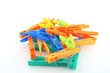 Color clothes-pegs over white