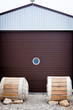 Photo: Rolled up two wooden boats to track against a elling Rolled up two wooden boats to track against a elling
