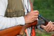 Hunter loading shotgun
