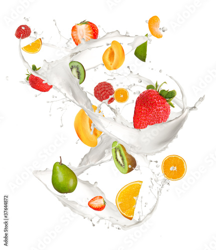 Photo: Mixed fruit in milk splash, isolated on white background Mixed fruit in milk splash, isolated on white background